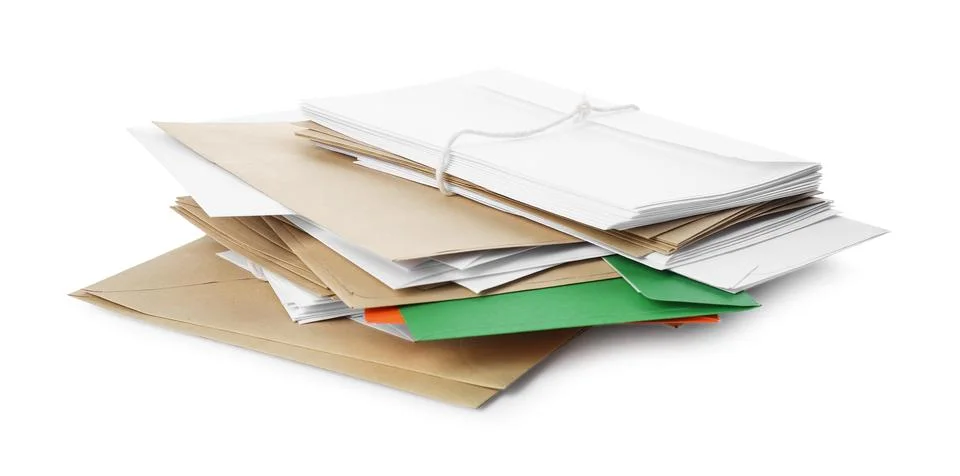 Stack of different paper envelopes on white background. Post office Foto stock