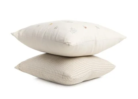 Stack of different pillows isolated on white Stockfoto's