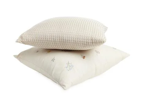 Stack of different pillows isolated on white Foto stock