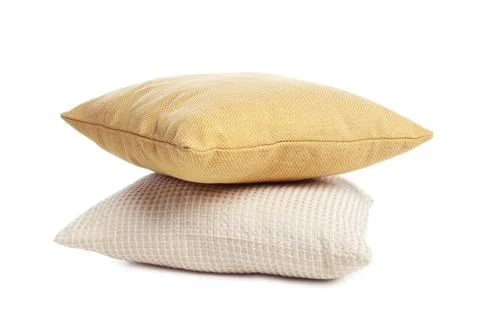 Stack of different pillows isolated on white Stockfoto's