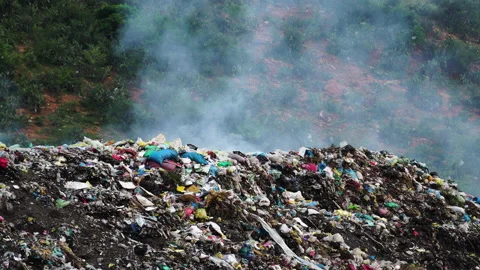 Stack Of Different Types Of Large Garbage Pile, Plastic Bags, And Trash In  Industrial Factory In Environmental Pollution. Waste Disposal In Dumping  Site In Urban City. Stock Photo, Picture and Royalty Free