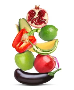 Stack of different vegetables and fruits isolated on white Stockfoto's