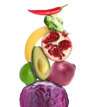 Stack of different vegetables and fruits isolated on white Foto stock
