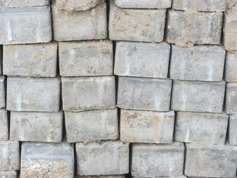 A stack of dirty gray bricks Stock Photos