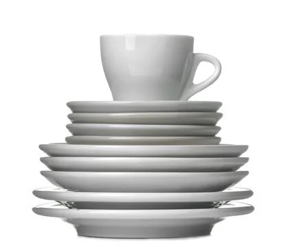 A stack of dishes. Dinnerware. plates and cup on a white isolated background. Foto stock