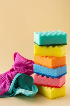 Stack of dishwashing sponges and microfiber napkins Stock Photos