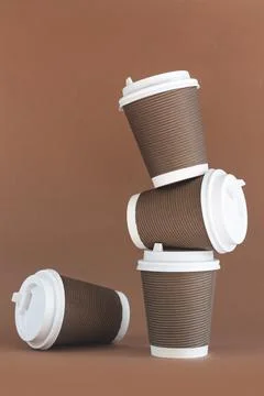 Stack of disposable paper coffee cup with cap Stock Photos