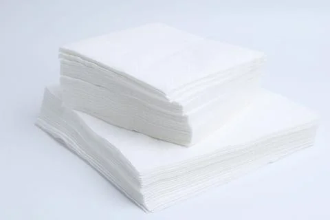 Stack of disposable paper handkerchiefs isolated on white Stock Photos