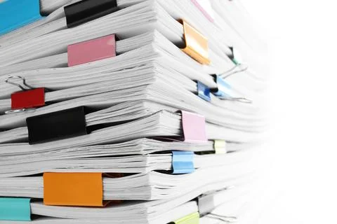 Stack of documents with colorful binder clips, closeup 库存照片