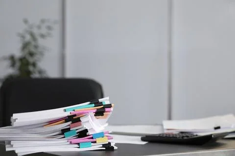 Stack of documents with paper clips on office table. Space for text 스톡 사진