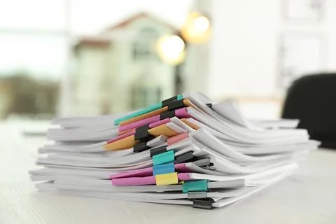 Stack of documents with paper clips on office table 스톡 사진