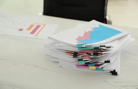 Stack of documents with paper clips on office table. Space for text 스톡 사진