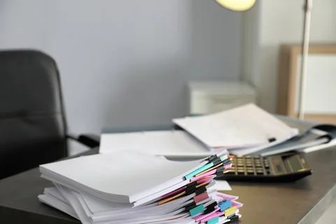Stack of documents with paper clips on office table. Space for text 스톡 사진