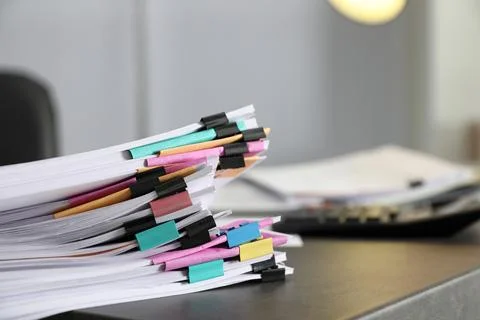 Stack of documents with paper clips on office table. Space for text 스톡 사진