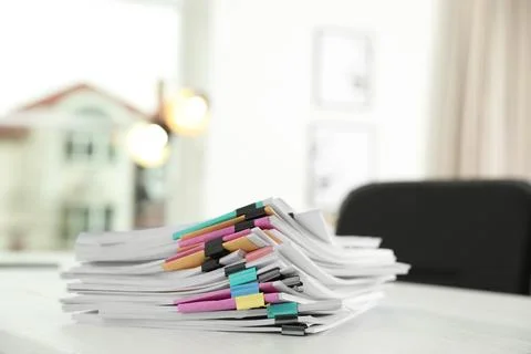 Stack of documents with paper clips on office table. Space for text 스톡 사진