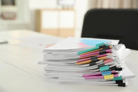 Stack of documents with paper clips on office table 스톡 사진