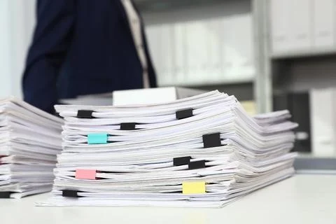 Stack of documents with paper clips on office desk 스톡 사진