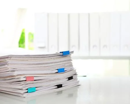 Stack of documents with paper clips on office desk. Space for text 스톡 사진