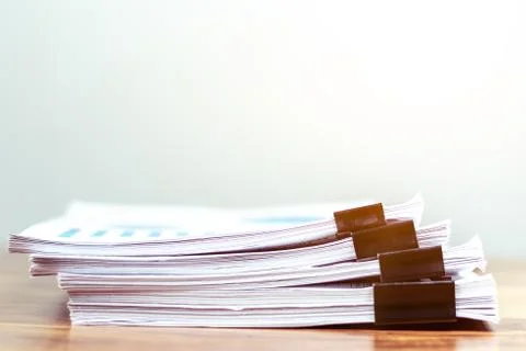 Stack of documents placed on a business desk in a business office. 스톡 사진