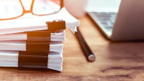 Stack of documents placed on a business desk in a business office. Foto stock