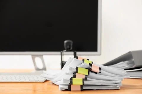 Stack of documents with stamp on desk in office, closeup Stock Photos