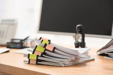 Stack of documents with stamp on desk in office, closeup Stock Photos