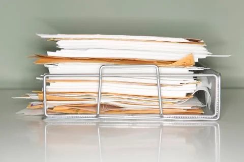 Stack of documents on tray Foto stock
