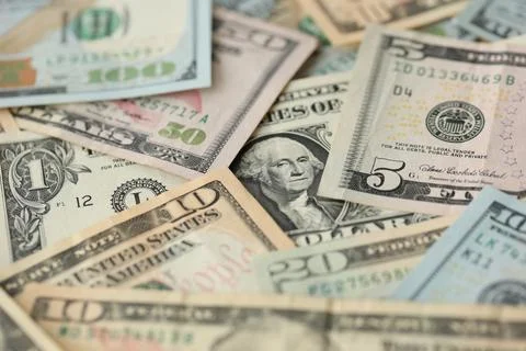 Stack of dollar bills. Hundred, fifty, twenty, ten, five dollars banknote close Stock Photos
