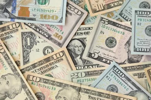 Stack of dollar bills. Hundred, fifty, twenty, ten, five dollars banknote close Stock Photos