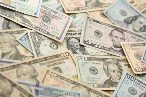 Stack of dollar bills. Hundred, fifty, twenty, ten, five dollars banknote close Stock Photos