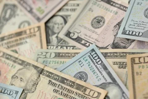 Stack of dollar bills. Hundred, fifty, twenty, ten, five dollars banknote close Stock Photos