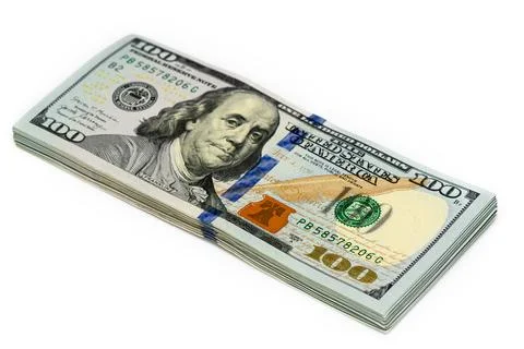 Stack of dollars with angry face of Franklin Foto stock