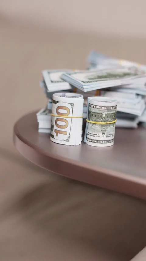 Stack of dollars on the edge Stock Footage 239267757