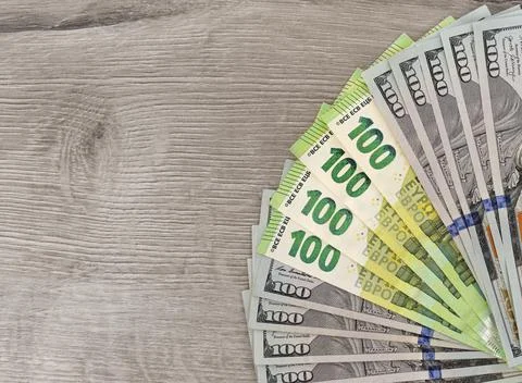 A stack of dollars lies on the floor. Stock Photos