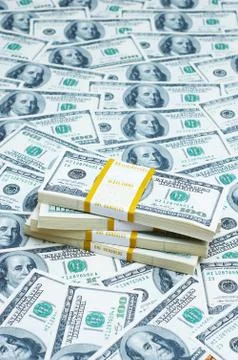Stack of dollars on money background 스톡 사진