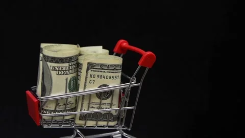 Stack of dollars rotating in trolley from supermarket Stock Footage 144663130