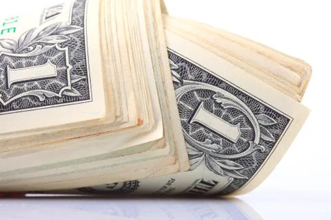Stack of dollars on white background Stock Photos