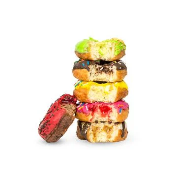 Stack of donuts with different fillings isolated on white background Stock Photos