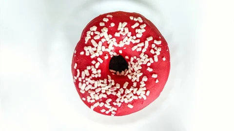 Stack of donuts, doughnuts appearing on white, stop motion animation 스톡 동영상 124461758