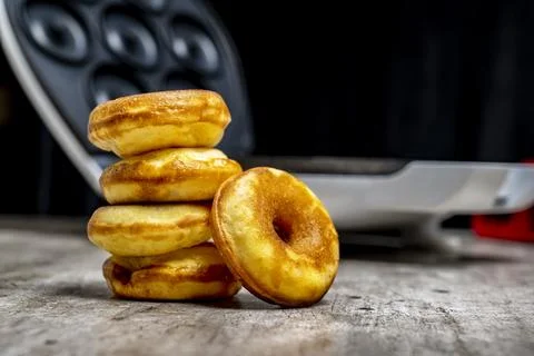A stack of donuts on a table Stock Photos