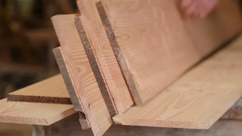 Stack of Douglas Fir planks for wooden boat building Stock Footage 304518611