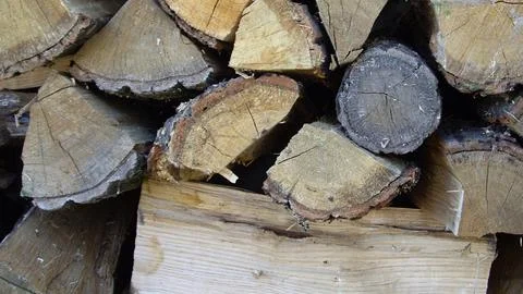 Stack of dried firewood ready for burning Stock Photos