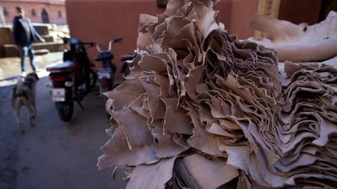 Stack of dried goatskin in the sunlight of the tanners district. Stock Footage 128395905