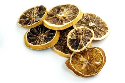 Stack of dried grapefruit and orange christmas decor on isolated background Stock Photos
