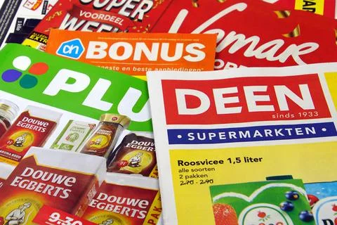 Stack of Dutch grocery shop flyers Stock Photos