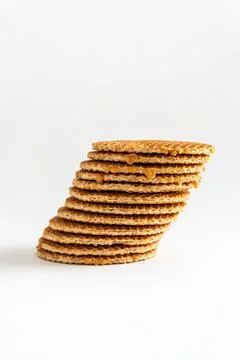 A stack of Dutch syrup waffle cookies ( stroopwafels) at an angle on white 写真素材