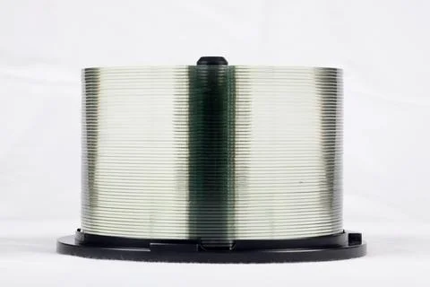 Stack Of DVDs Against A White Background In A Studio Environment 写真素材