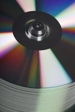 Stack Of DVDs Against A White Background In A Studio Environment Foto stock