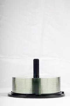 Stack Of DVDs Against A White Background In A Studio Environment Foto stock