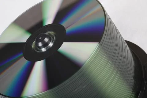 Stack Of DVDs Against A White Background In A Studio Environment 写真素材